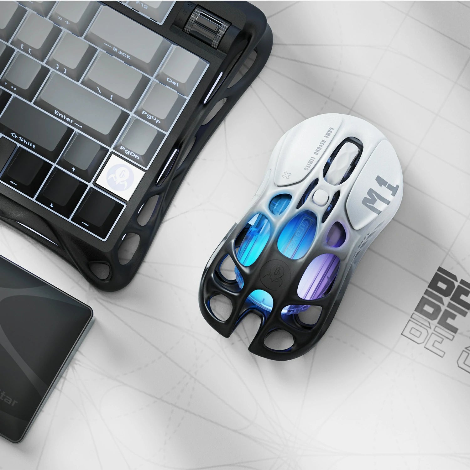 GravaStar Mercury M1 Pro Gradient Black gaming mouse: magnesium alloy skeleton, PAW3395 sensor (26K DPI), ergonomic design, customizable RGB lighting, 146h wireless/200h Bluetooth battery life.