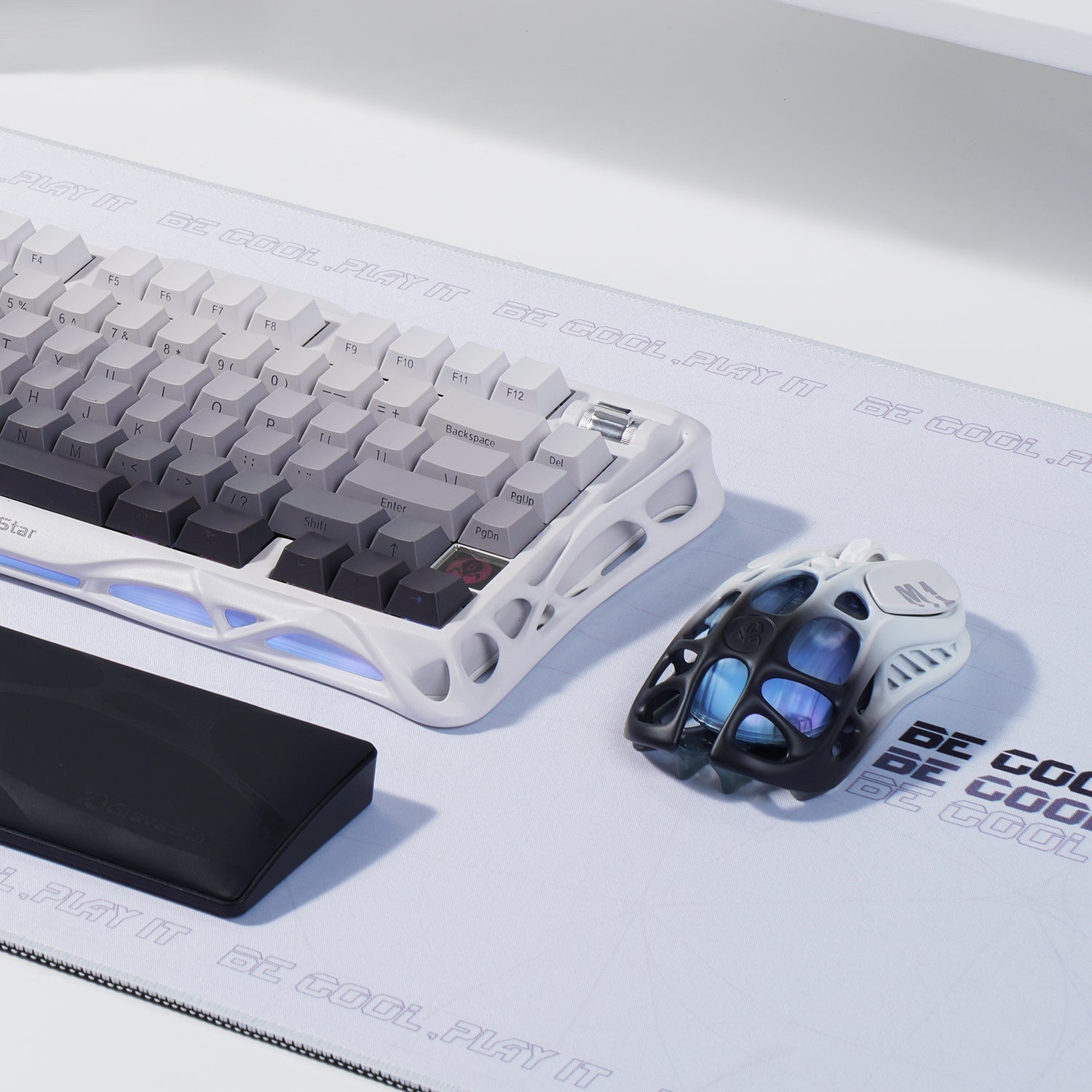 GravaStar Pro Gaming Set in Gradient White, showcasing Mercury K1 gradient black keyboard (RGB underlight, silent keycap surface) paired with Mercury M1 Pro gradient black mouse and 4K wireless dongle, displayed with free GravaStar Mini Mouse Pad (worth $9.95); featuring aluminum alloy exoskeleton, 88g skeletal magnesium alloy frame (ultra-lightweight, ergonomic ambidextrous design), hot-swap switch system (supports 3-pin/5-pin switches with Kailh Linear included), and customizable RGB lighting (16.7M color