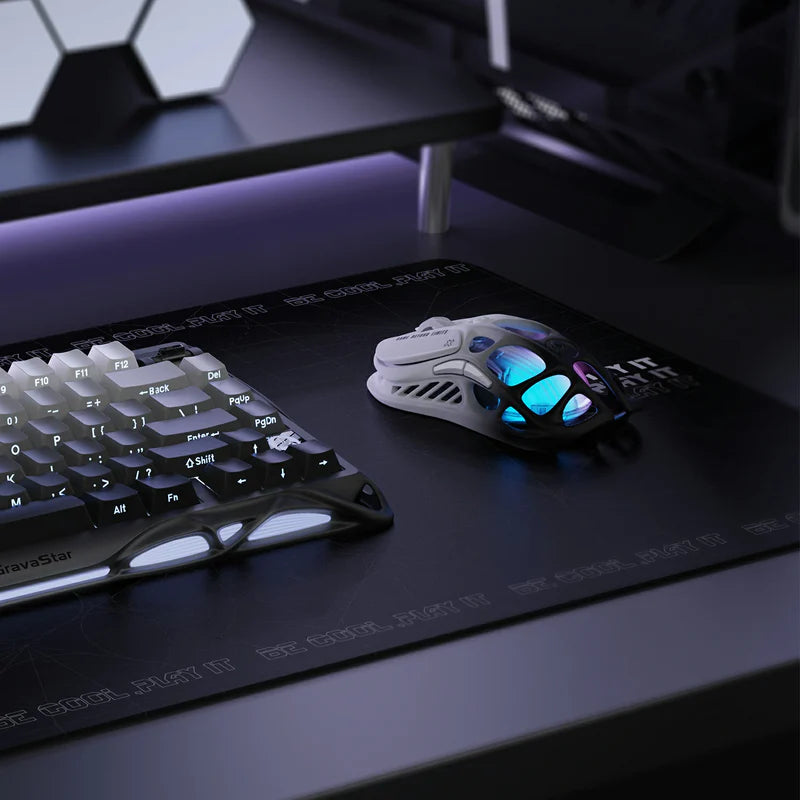 GravaStar Pro Gaming Set in Gradient Black, showcasing Mercury K1 gradient black keyboard (RGB underlight, silent keycap surface) paired with Mercury M1 Pro gradient black mouse and 4K wireless dongle, displayed with free GravaStar Mini Mouse Pad (worth $9.95); featuring aluminum alloy exoskeleton, 88g skeletal magnesium alloy frame (ultra-lightweight, ergonomic ambidextrous design), hot-swap switch system (supports 3-pin/5-pin switches with Kailh Linear included), and customizable RGB lighting (16.7M color