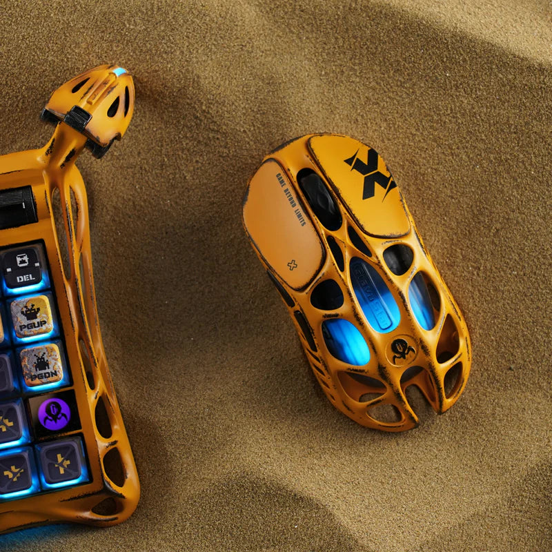 GravaStar Handcrafted Gaming Set in Battle-Worn Yellow, showcasing Mercury K1 Pro Special Edition and Mercury X Pro Special Edition gaming peripherals—each with a unique one-of-a-kind handcrafted aluminum alloy frame featuring Battle-Worn-inspired aesthetics. Includes a free GravaStar Keyboard Wrist Rest Pad (worth $12.95). Highlighted features: 75% compact layout for space-saving, dynamic RGB lighting (16.8M colors, 13 modes with South-facing key backlighting), premium build with 70M keystroke-rated switch